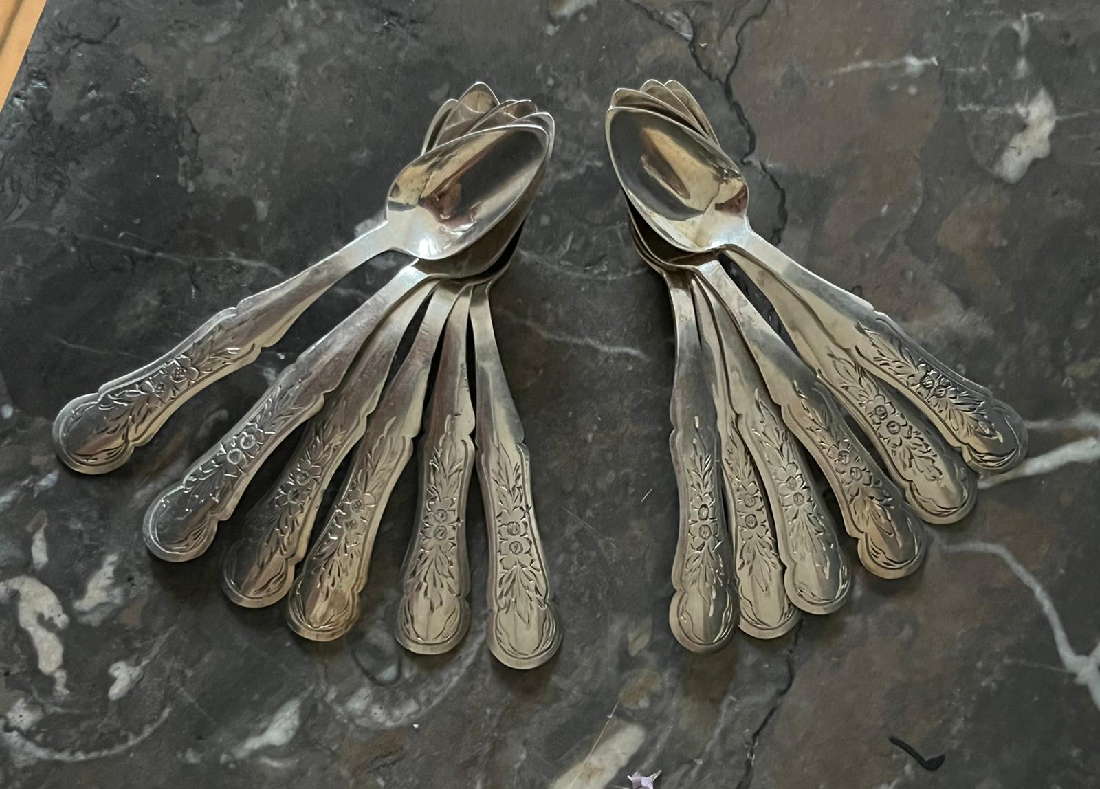 12 silver mocha spoons with flower decoration dating from 1916