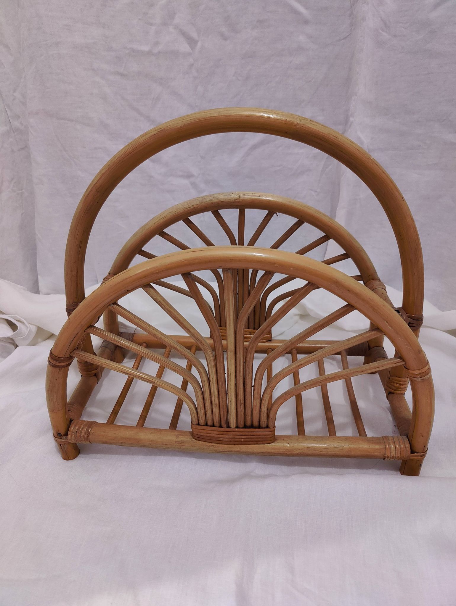 Woven bamboo magazine rack from the 1970s