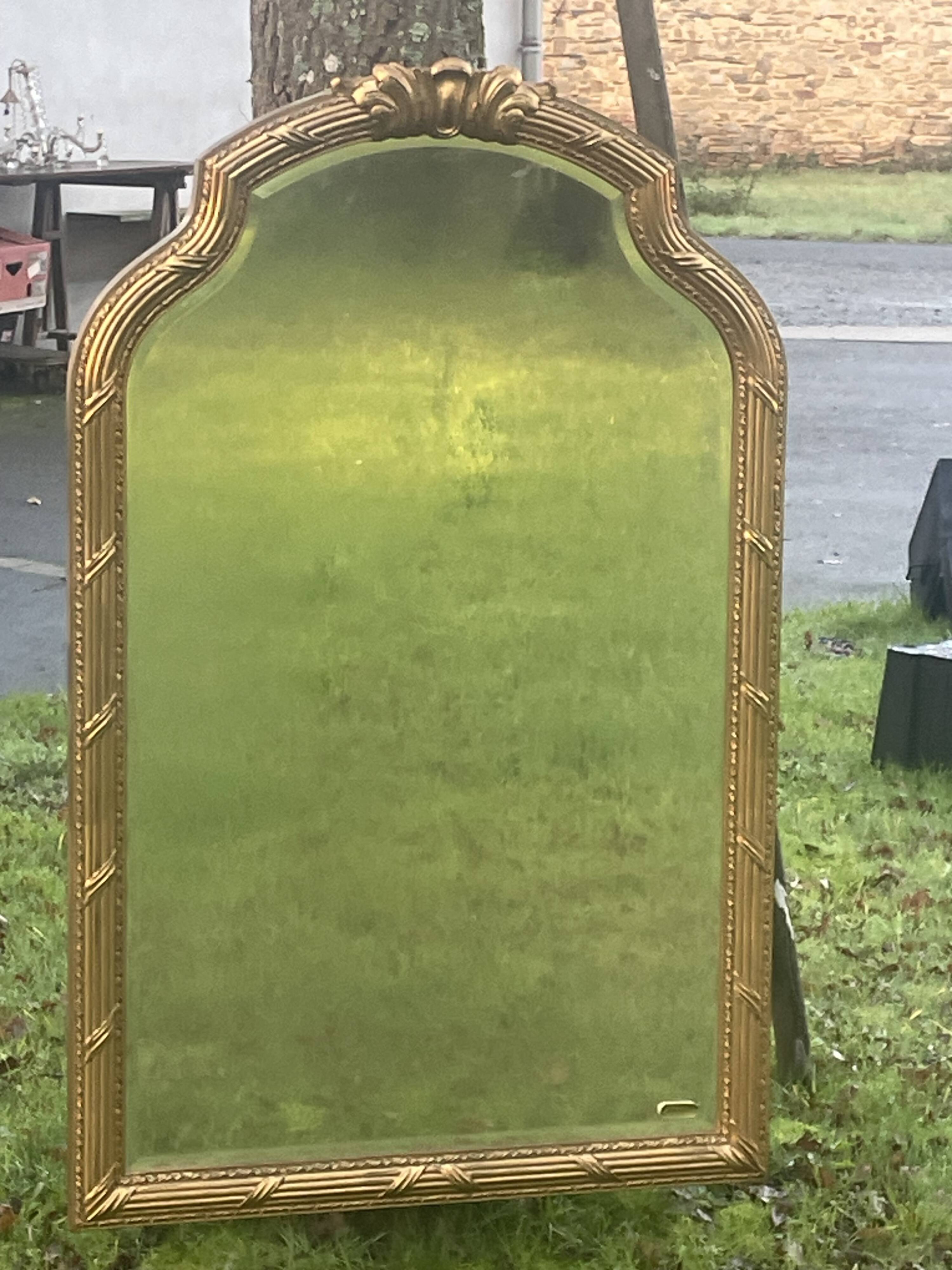 Imposing neo-classical style mirror, wood and stucco "Deknudt"