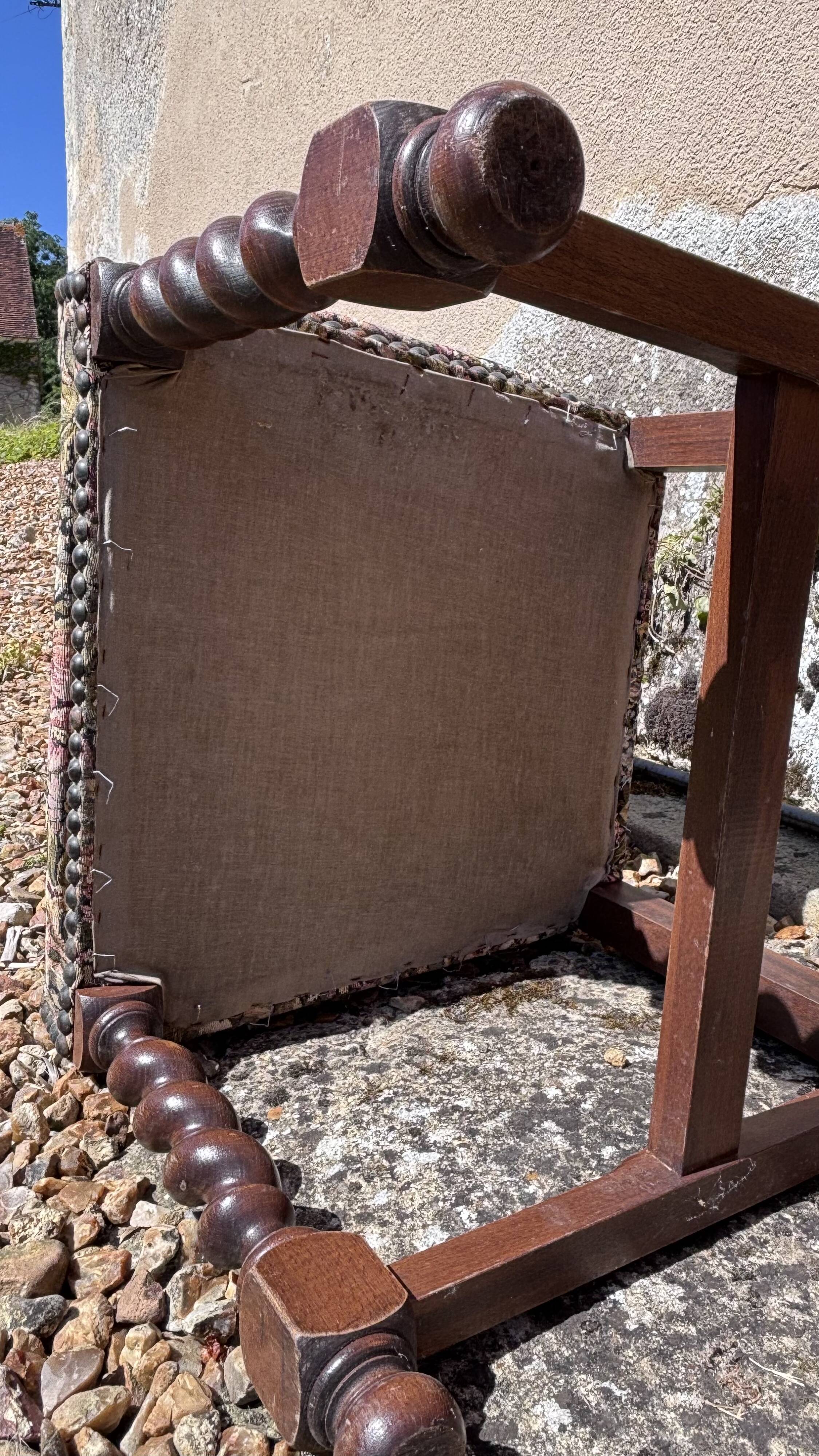 Colonial armchair in solid wood and weaving