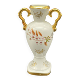 Small amphora vase in Limoges porcelain with gilded handles.