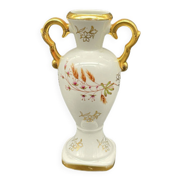 Small amphora vase in Limoges porcelain with gilded handles.