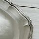 oval silver metal plate