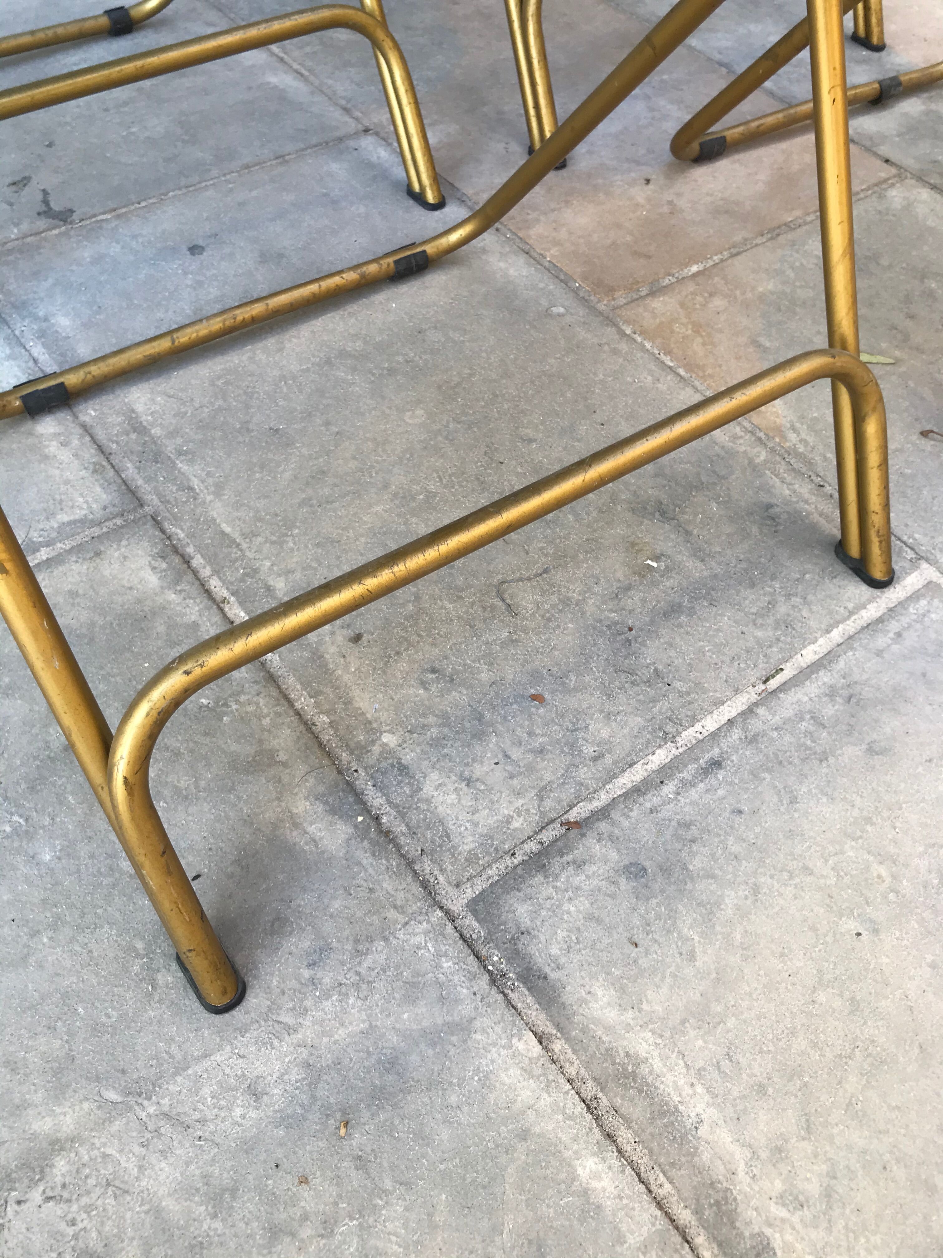 Set of 4 folding chairs in brass and mustard velvet striped by "Lafuma" 1960