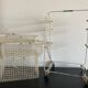 Metal serving trolley on wheels