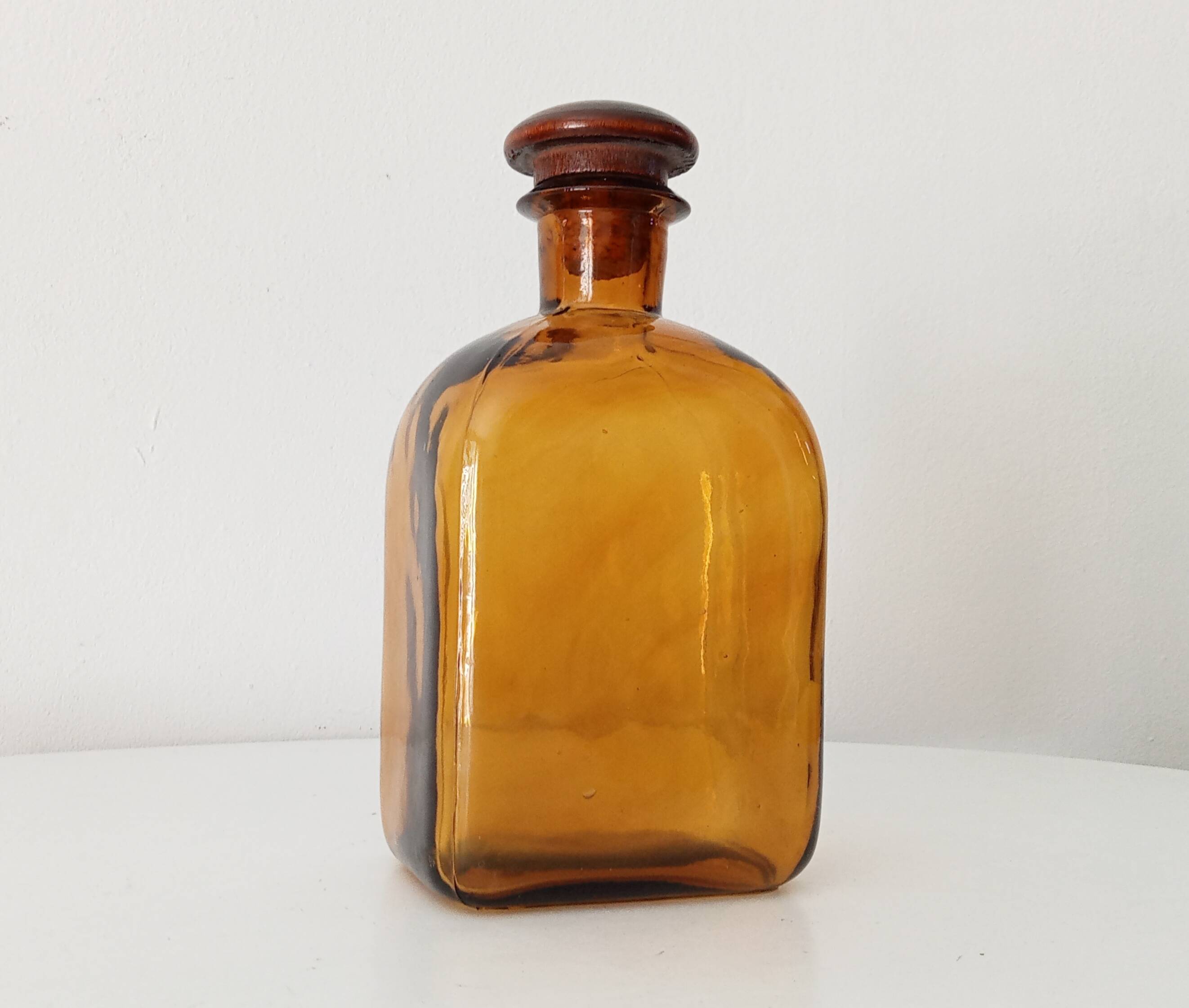 Vintage amber glass apothecary bottle