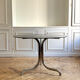 Table ronde en verre fumé et chrome