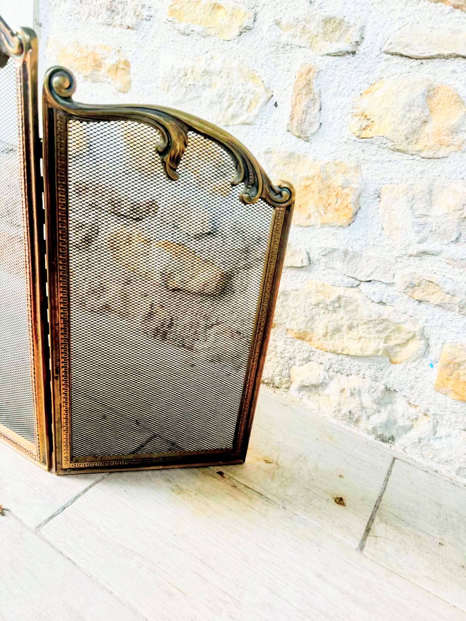 Brass fireplace screen in Louis XV style