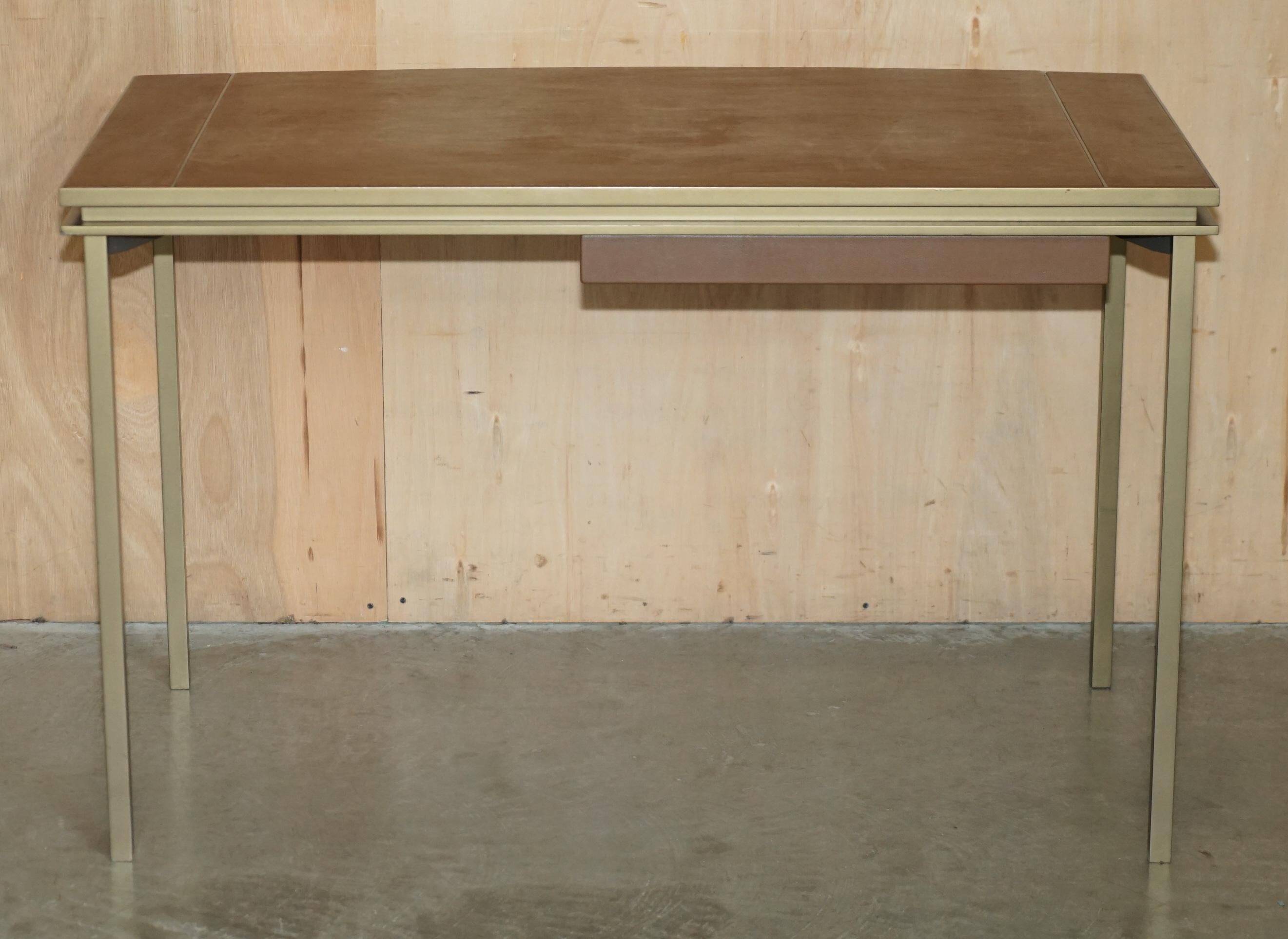 Modern mid-century writing desk signed Cartier in bronze and leather.