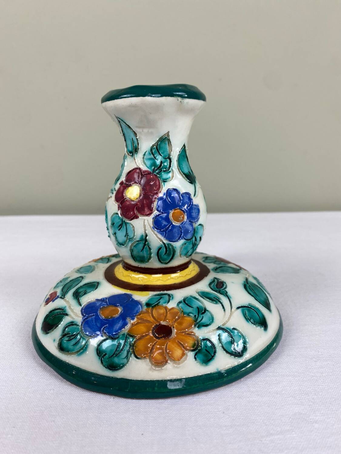 Decorated ceramic candle holder