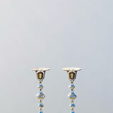 Two antique metal candle holders