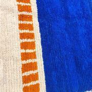 Tapis traditionnel en laine pure fait main à motifs colorés