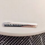 Tulip table white base and black marble marked by Saarinen edition knoll international