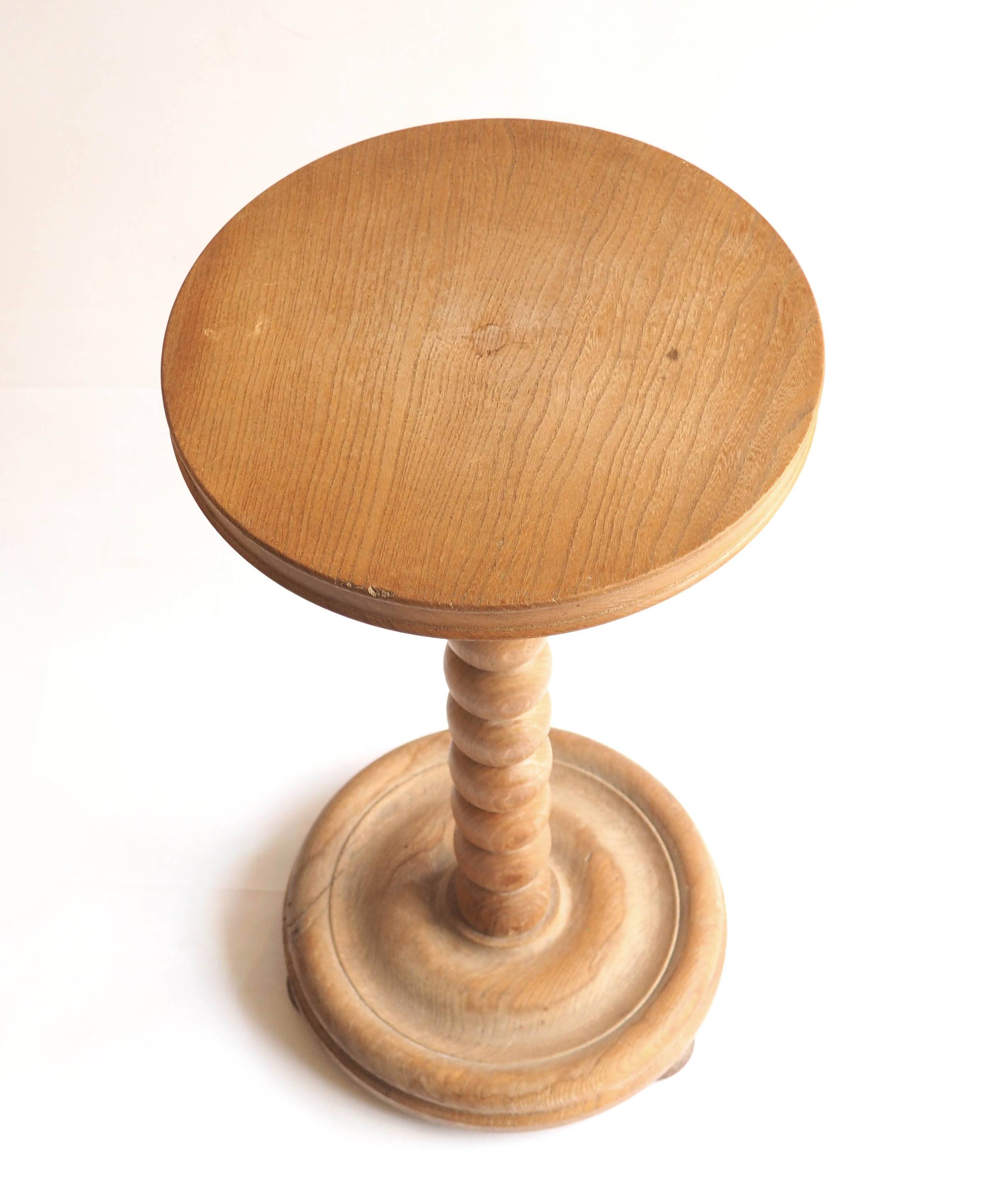 Beaded wood pedestal table
