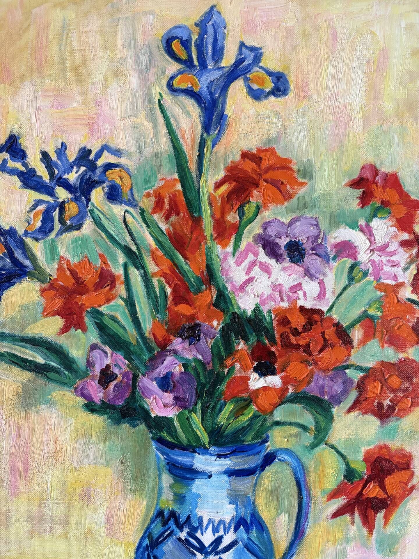 Iris and orange carnations, oil on canvas signed Gisèle Renaut.