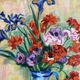 Iris and orange carnations, oil on canvas signed Gisèle Renaut.