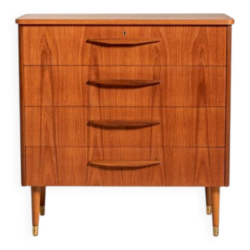 Teak chest of drawers with brass ferrules