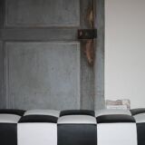 Banquette Roche Bobois cuir damier noir et blanc, banquette basse