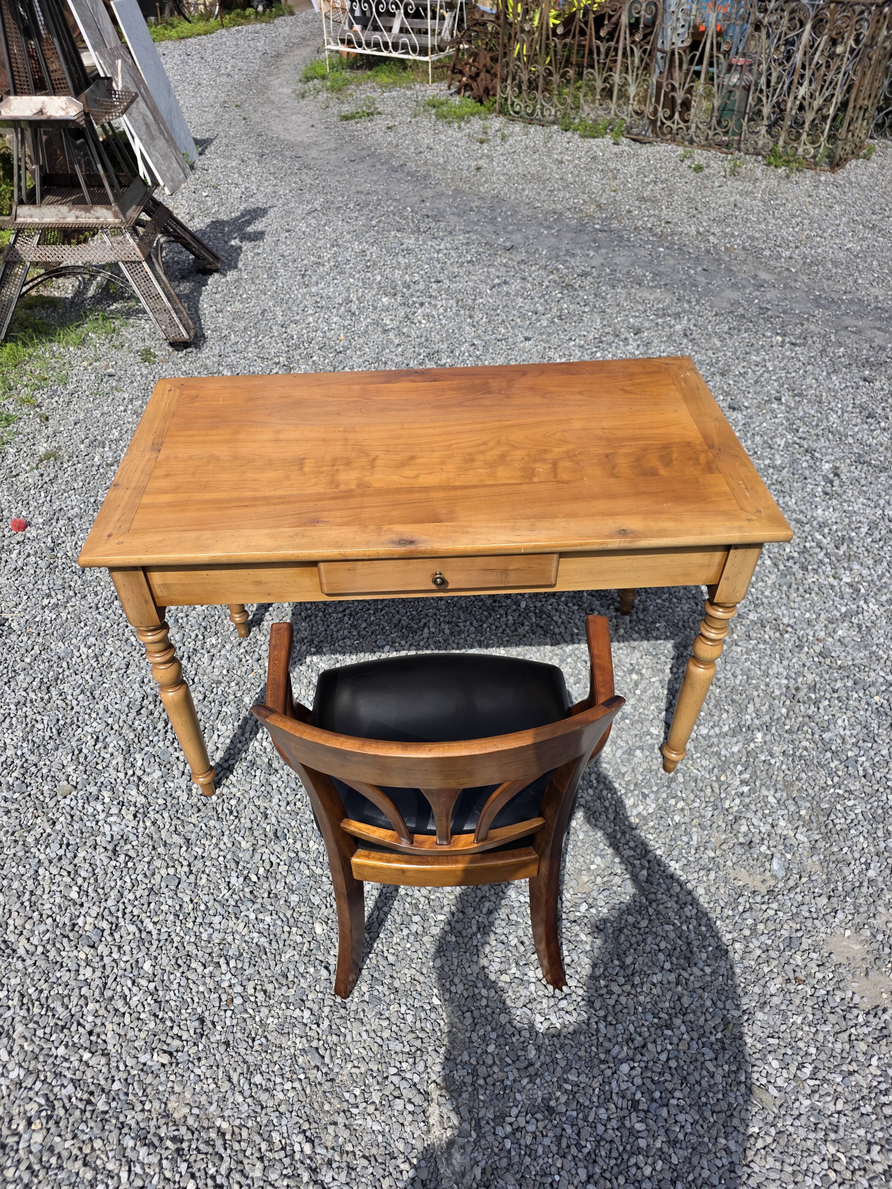Mid-20th century solid cherry wood office chair.