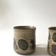 Set of 2 glazed ceramic coffee mugs from around 1970.