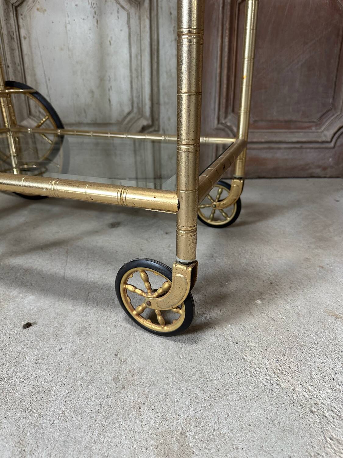 Vintage gold bar cart serving trolley