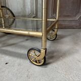 Vintage gold bar cart serving trolley
