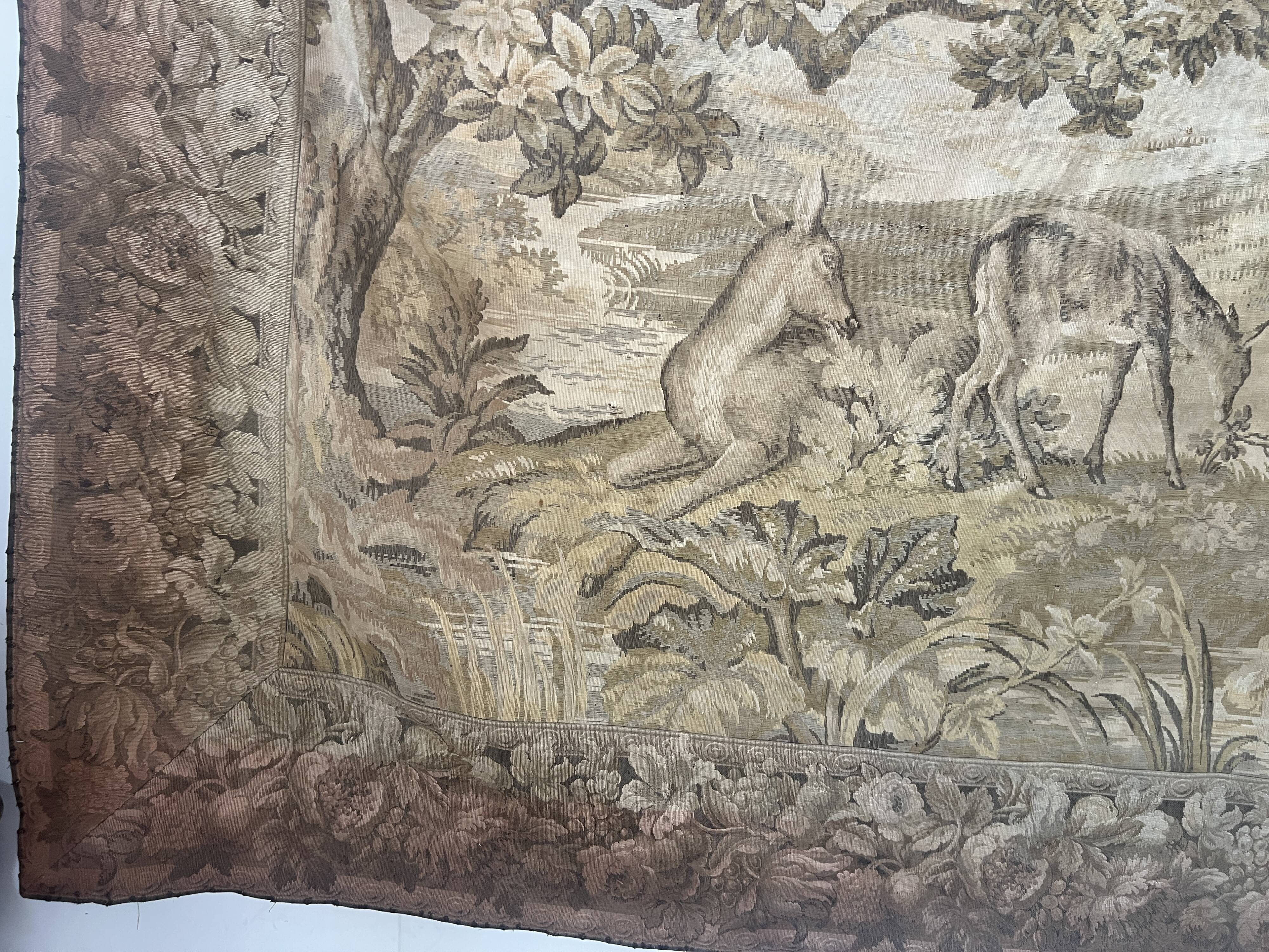 Renaissance-style tapestry with animal motifs, 20th century.