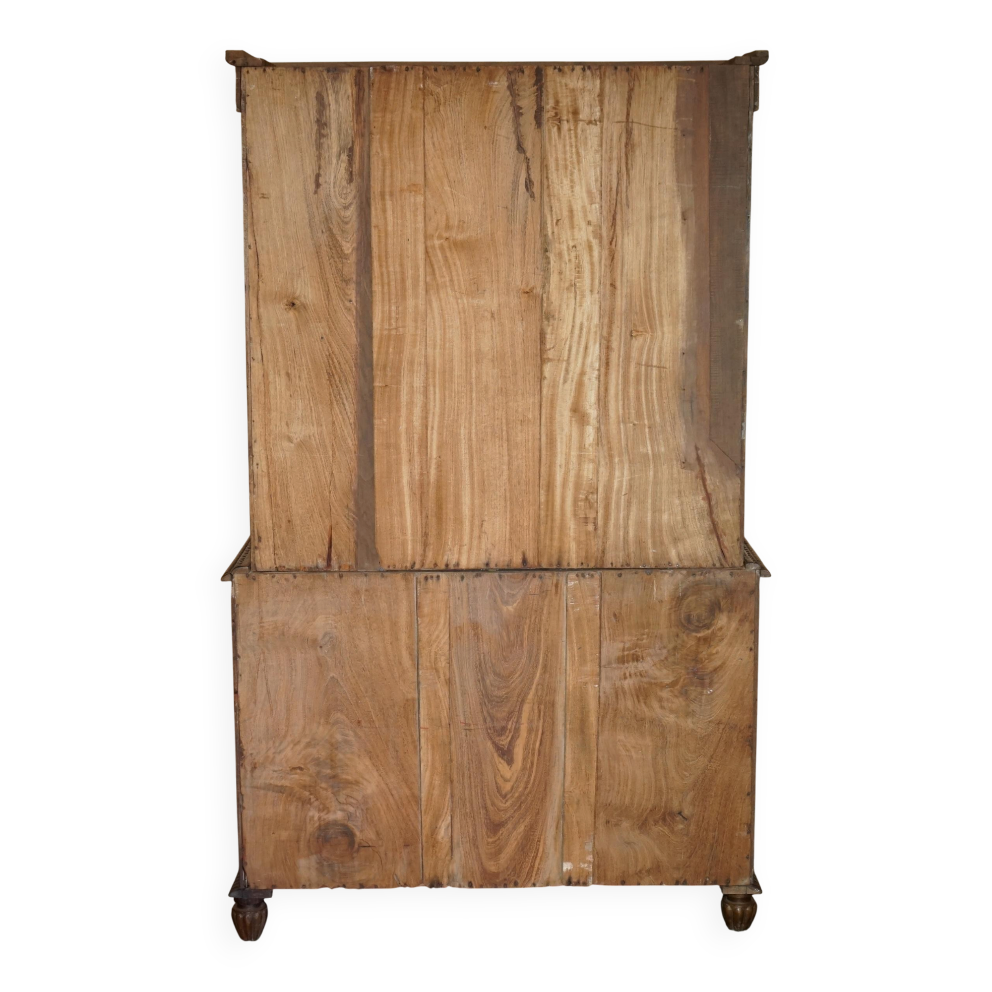 19th-century Anglo-Indian colonial hardwood library on a chest of drawers.