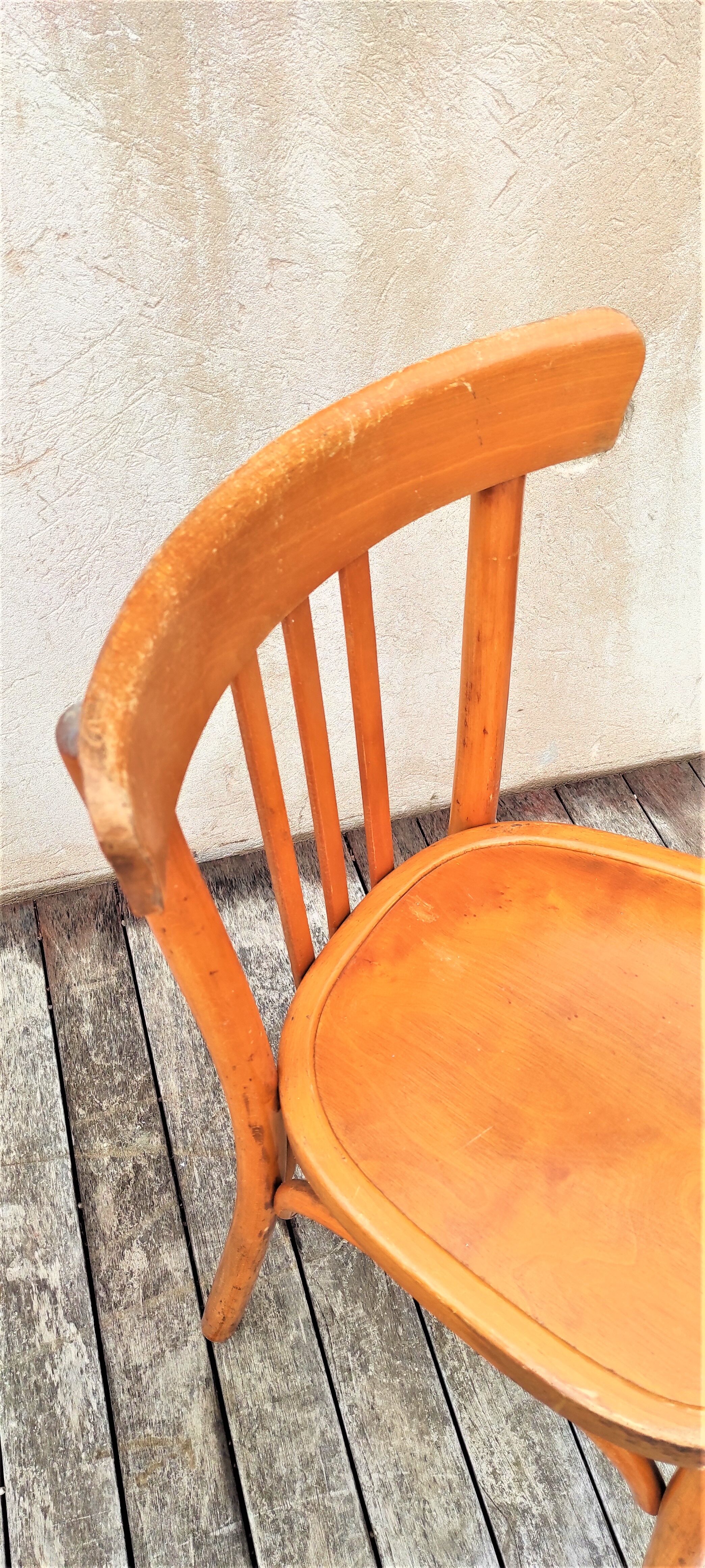 Pair of bistro chairs with bars