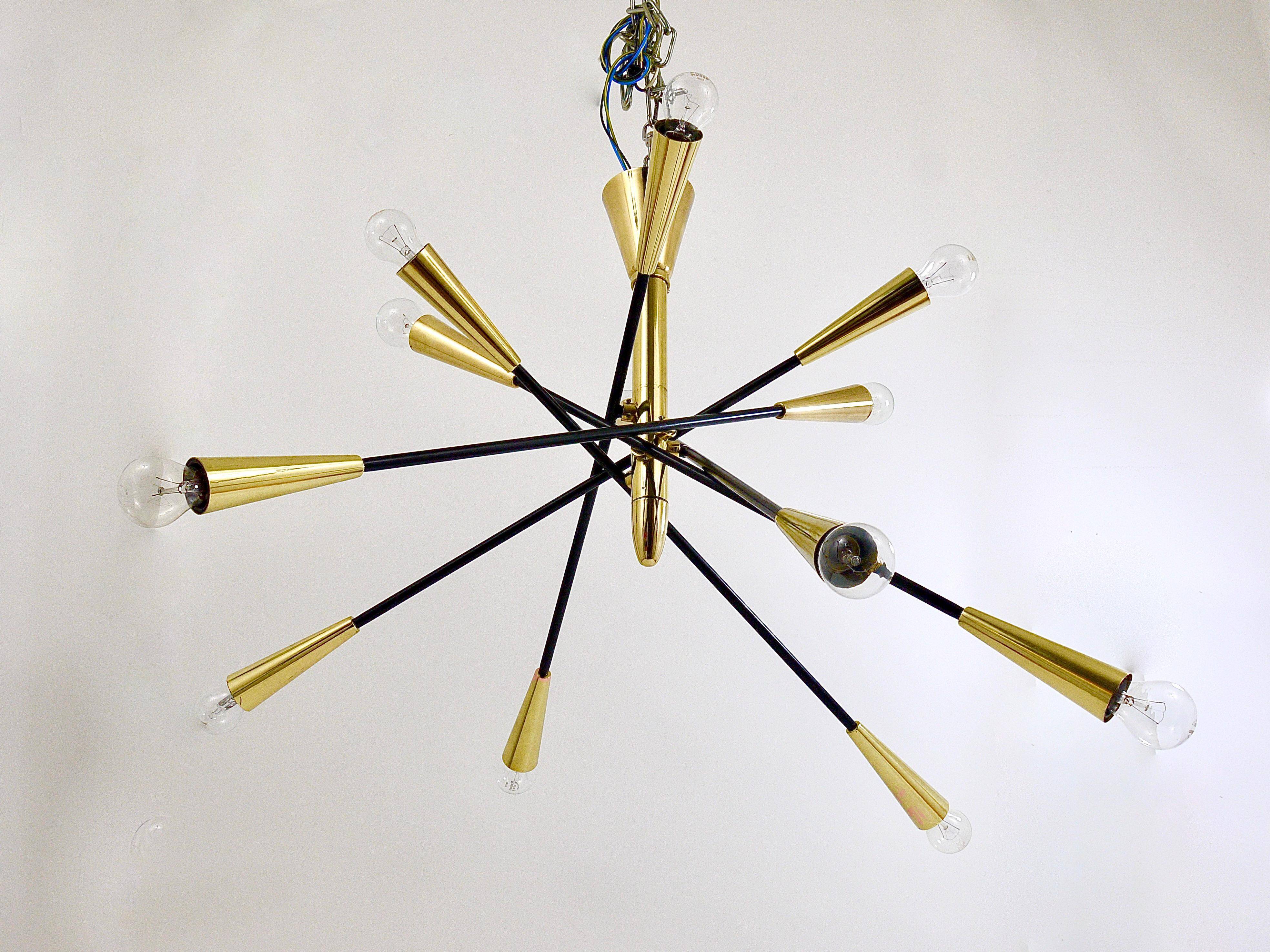 Black and brass articulated Sputnik chandelier in Stilnovo style, Italy, 1950.