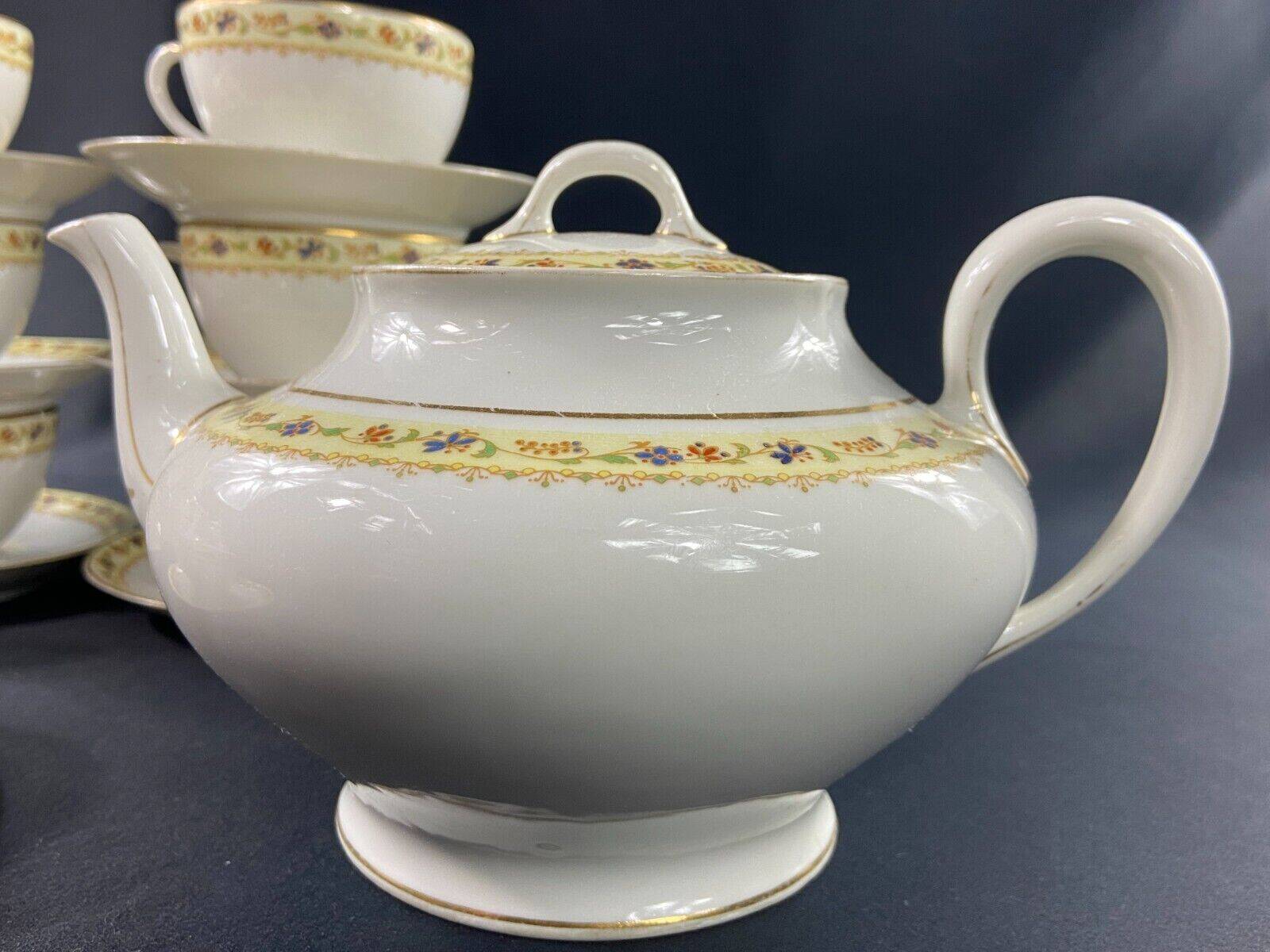 Limoges porcelain tea set Bernardaud Teapot sugar bowl milk pot cups