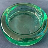 Pair of ashtrays or empty round glass pockets