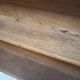 Old wall shelf in raw wood