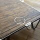 Industrial coffee table: mining cart, weathered wood top, quarries.