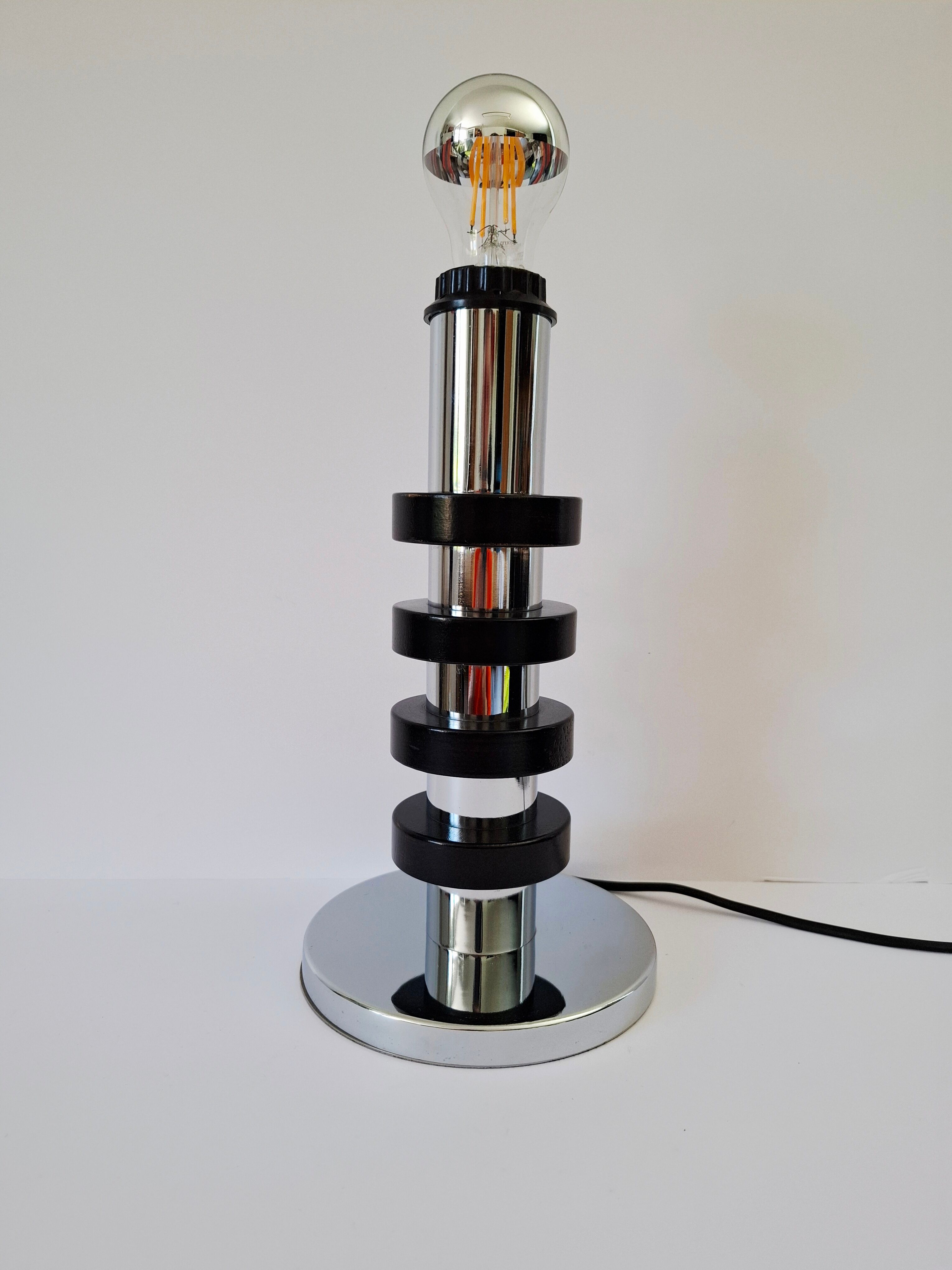 Chrome metal and wood lamp base from the 70s.