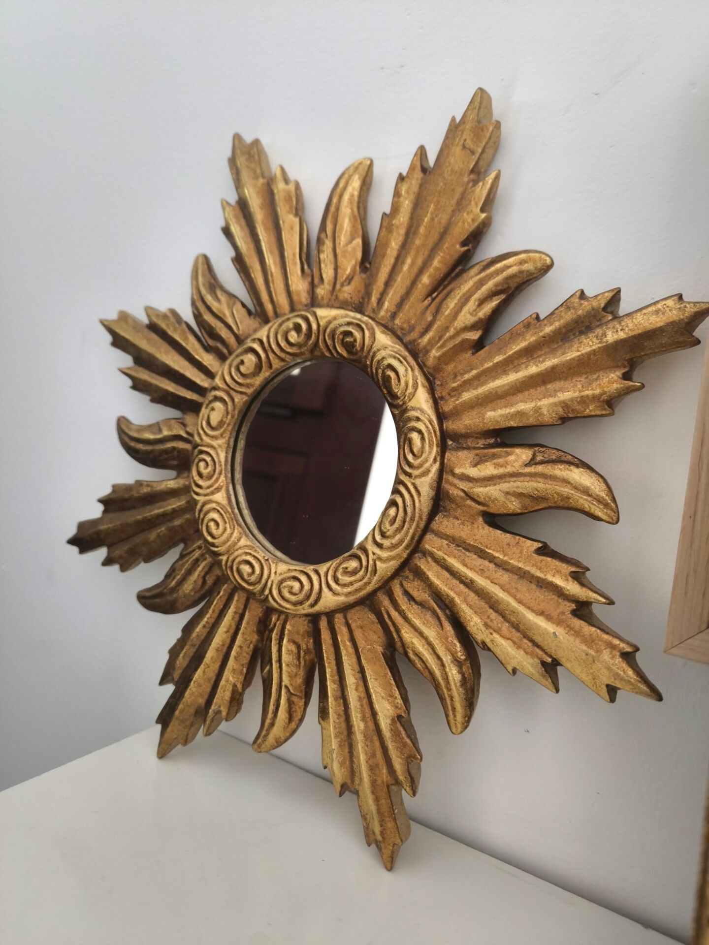 Miroir soleil doré