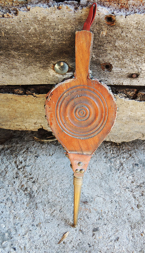 Old bellows in wood & leather pattern concentric circles