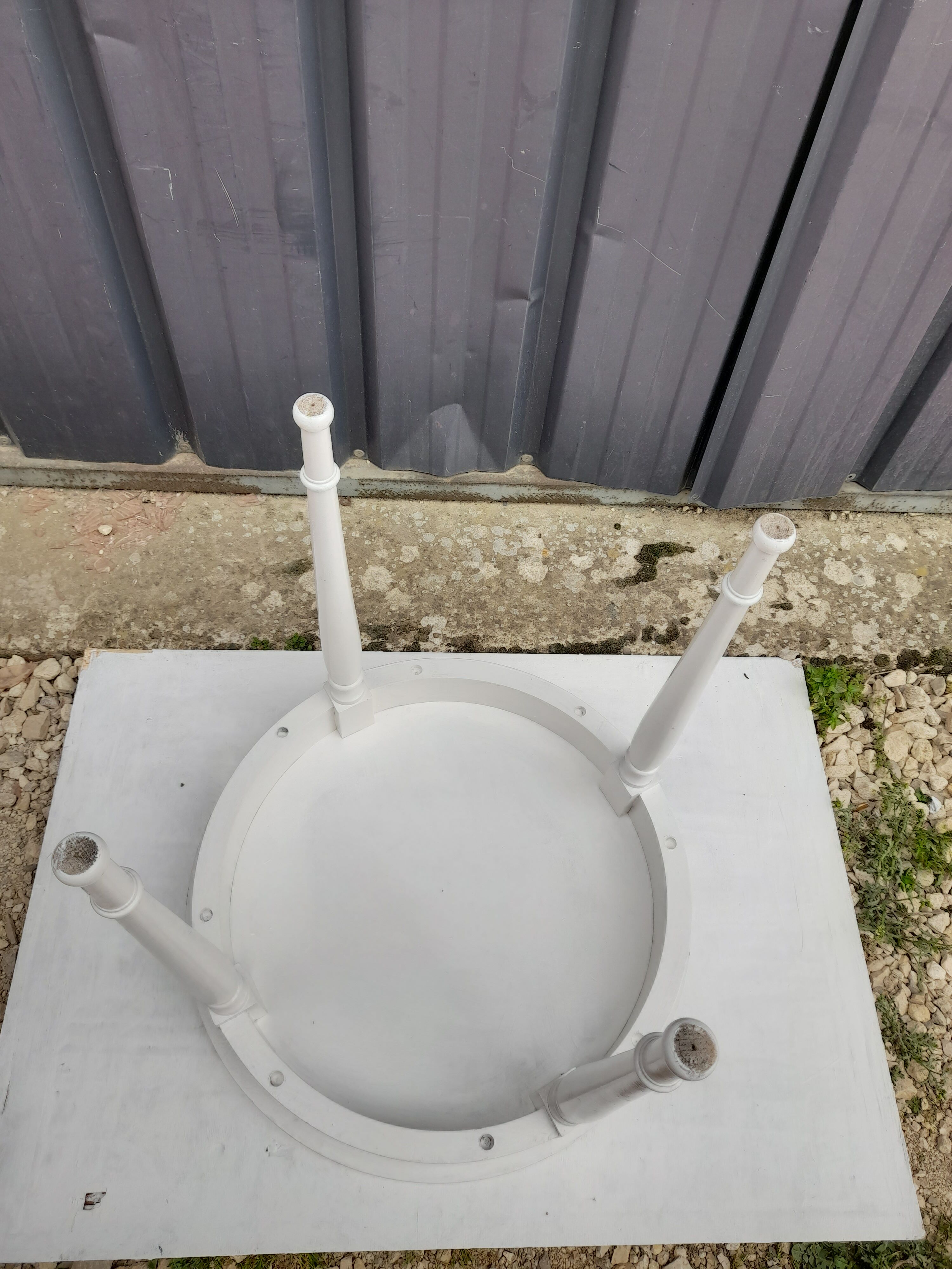 Side table in chestnut painted white