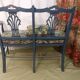 Pretty painted and upholstered bench in green and blue.