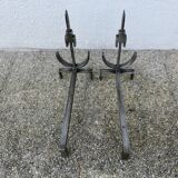 Pair of modernist andirons in forged and hammered steel, French work