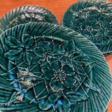 Set of 10 green earthenware dessert plates with a finely embossed floral pattern