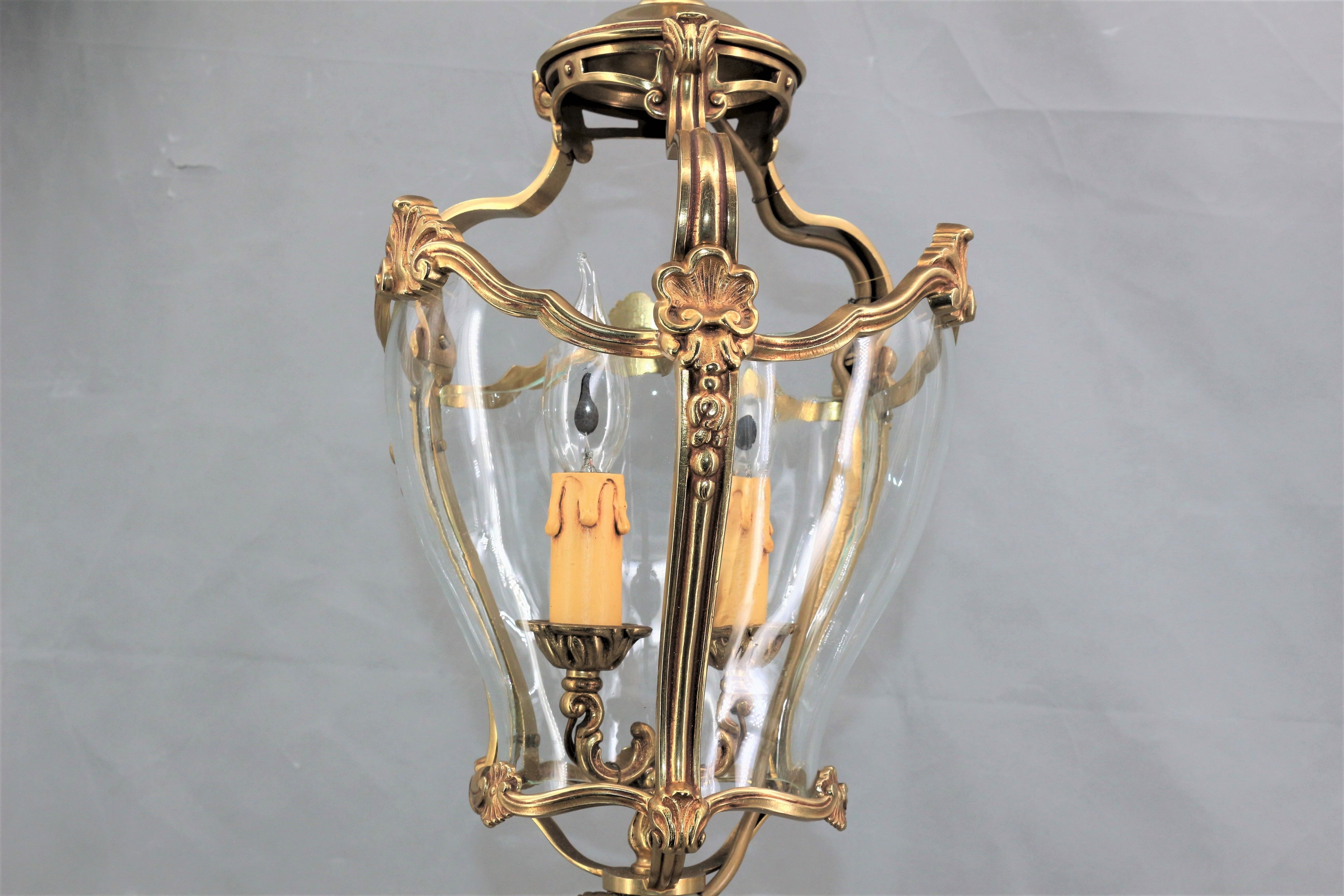 Lustre en bronze et verre bombé