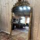 Napoleon III mirror in wood and gilded stucco with gold leaf.