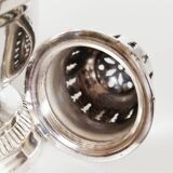Silver-plated sugar shaker with fluted edges