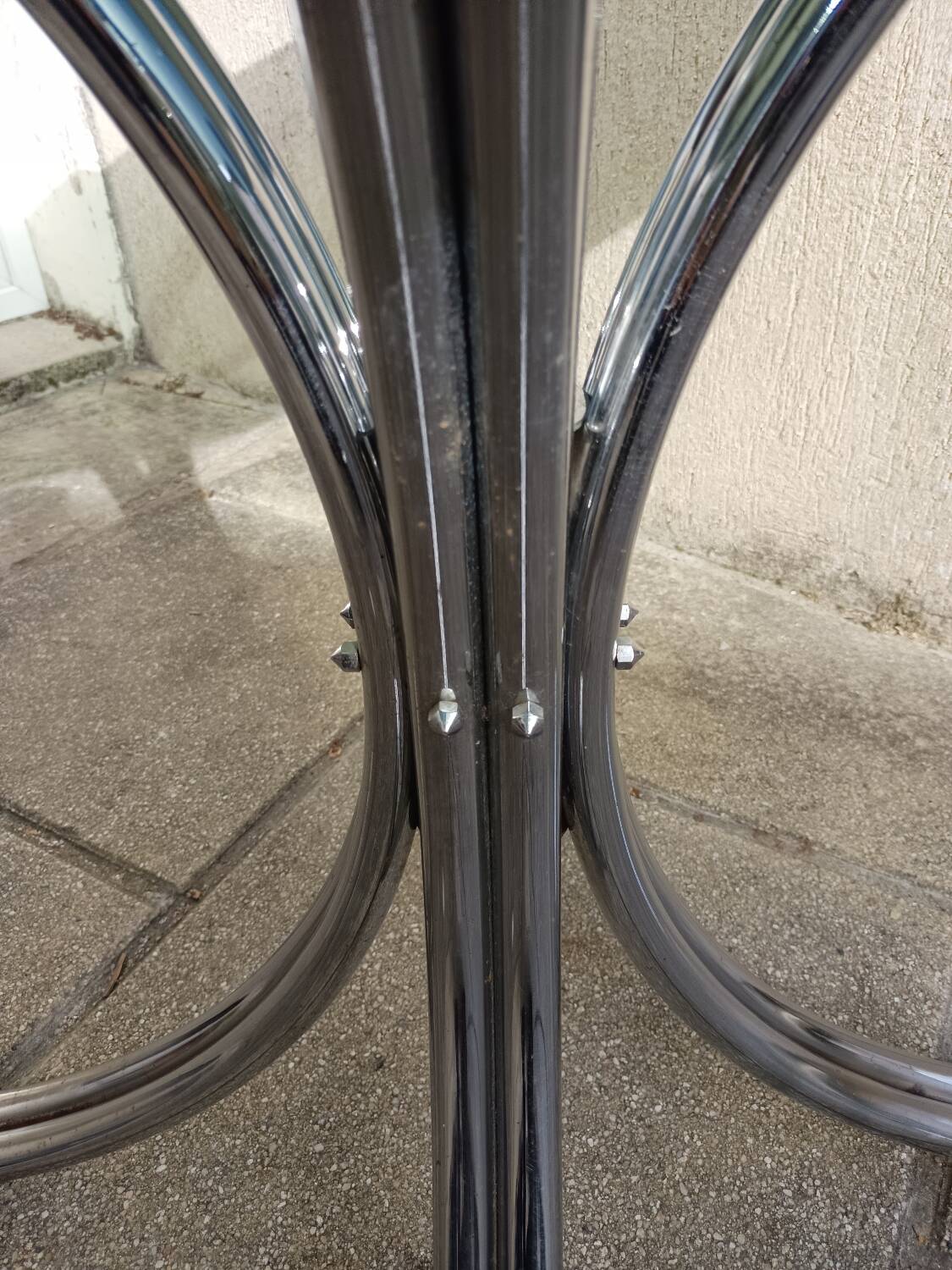 Chromed metal and smoked glass table