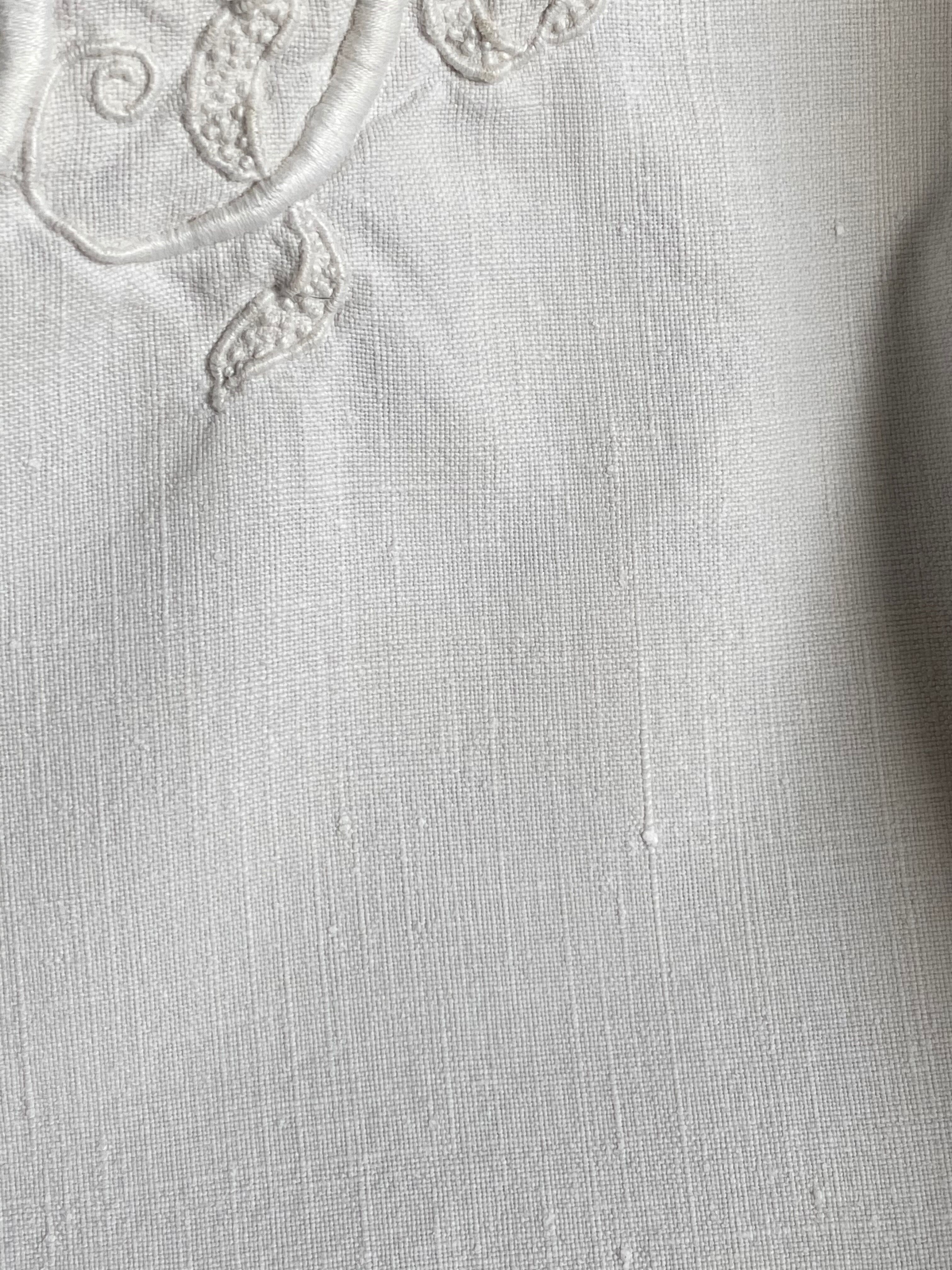 Old sheet with monogram