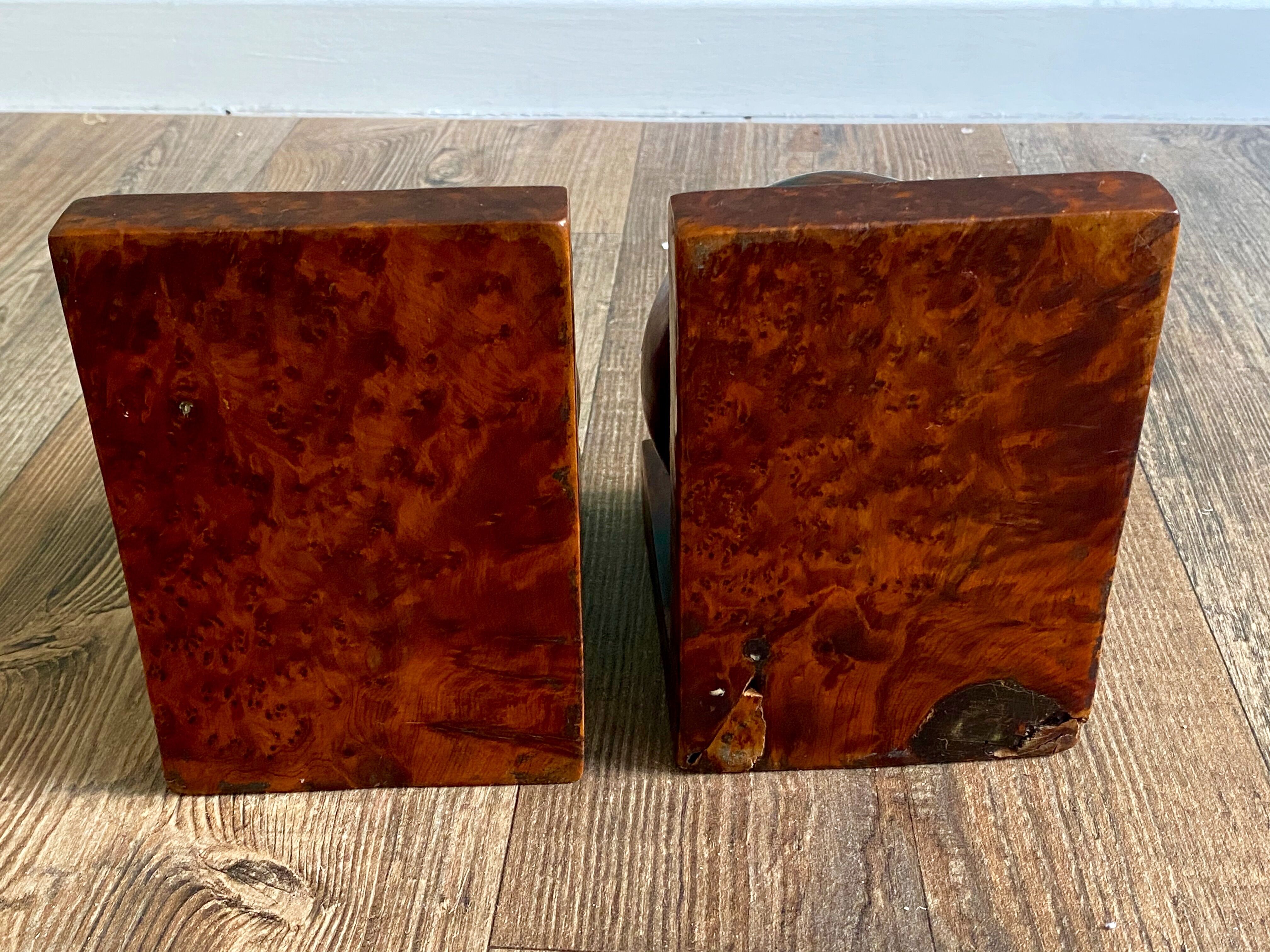 Pair of bookends adorned with spheres