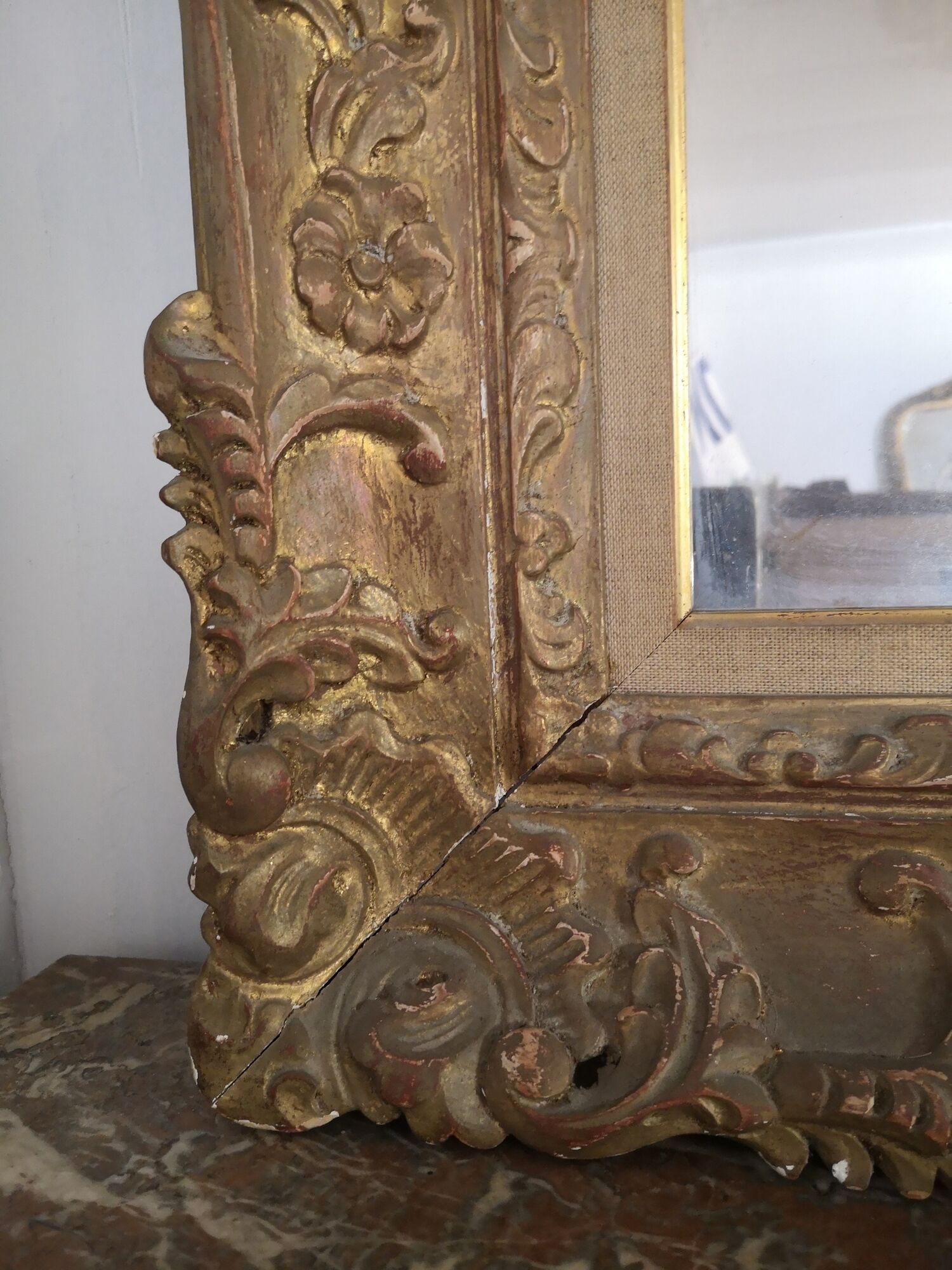Carved and gilded wooden mirror early in the 20th century  - 96x76cm