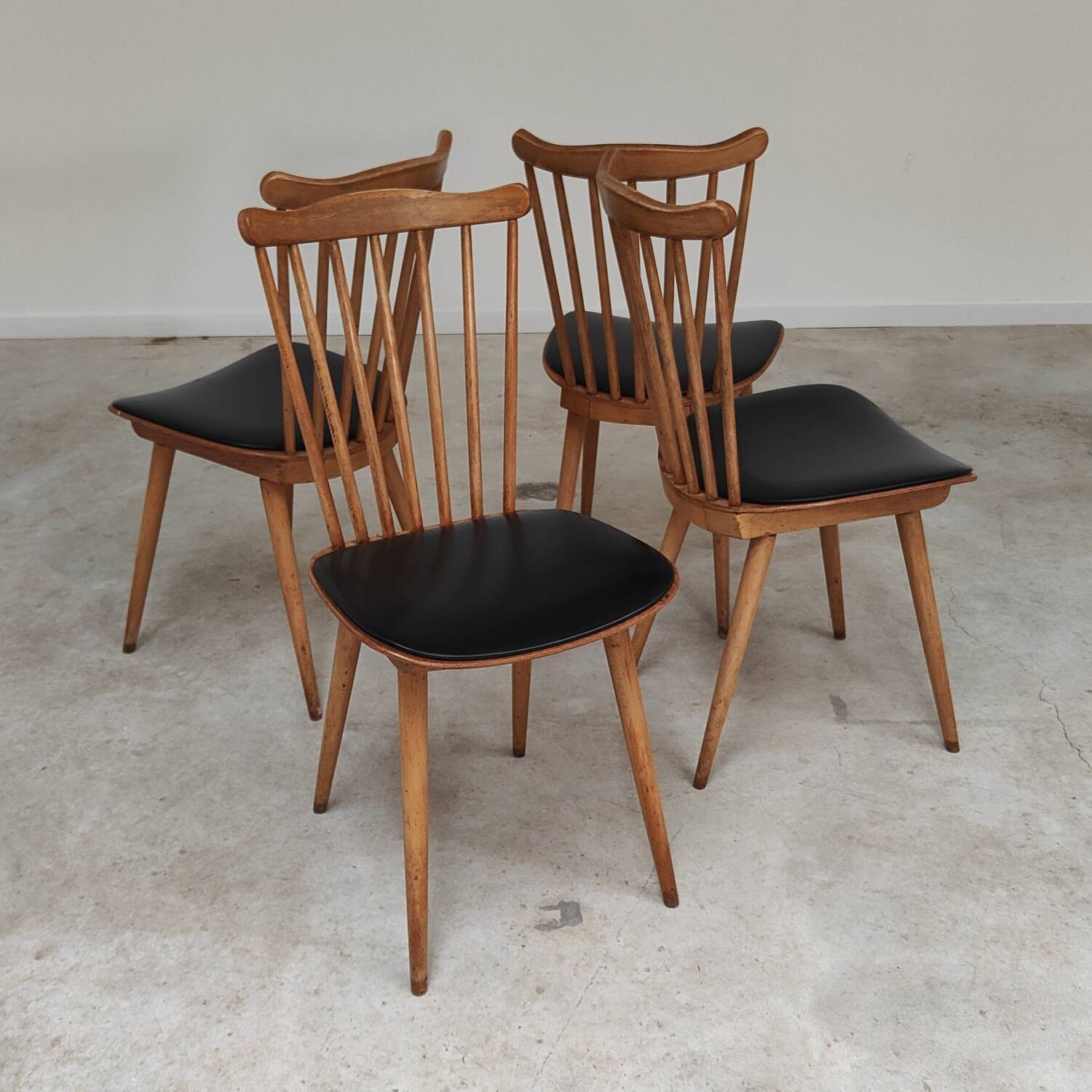 Set of 4 Baumann Menuet chairs black leatherette compass legs