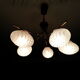 Cosmic brass and chiseled glass chandelier